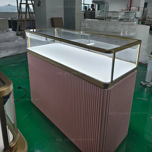 粉色竖纹珠宝销售柜台 香槟金包边玻璃LED柜 商场珠宝店接待洽谈柜